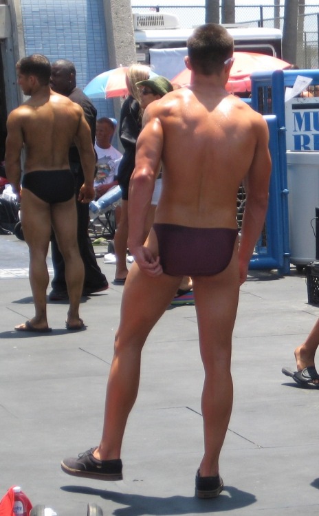 Purple posing trunks.