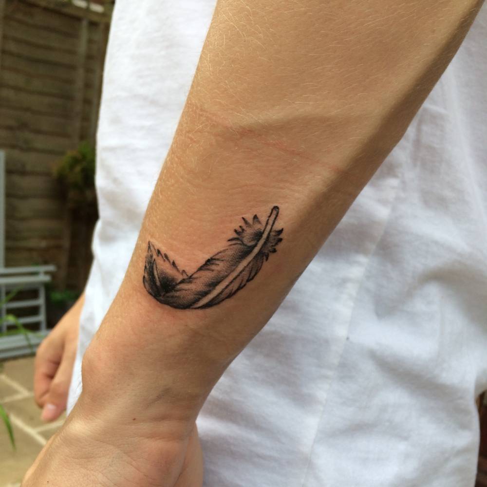 N.A Tattoo Studio - Feather tattoos are a popular choice for women to get  inked, and although they are common, they are significant. The symbol is  often associated with ideas of freedom,