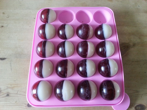 thedrunkenmoogle:  Vodka Cherry Pokeballs I’ve seen rummy bears and vodka gummy worms, but what if you want something a bit more gamer themed? Imgur user BigEatsBen melted some bags of various colored gummy candy, mixed it with vodka, and formed each