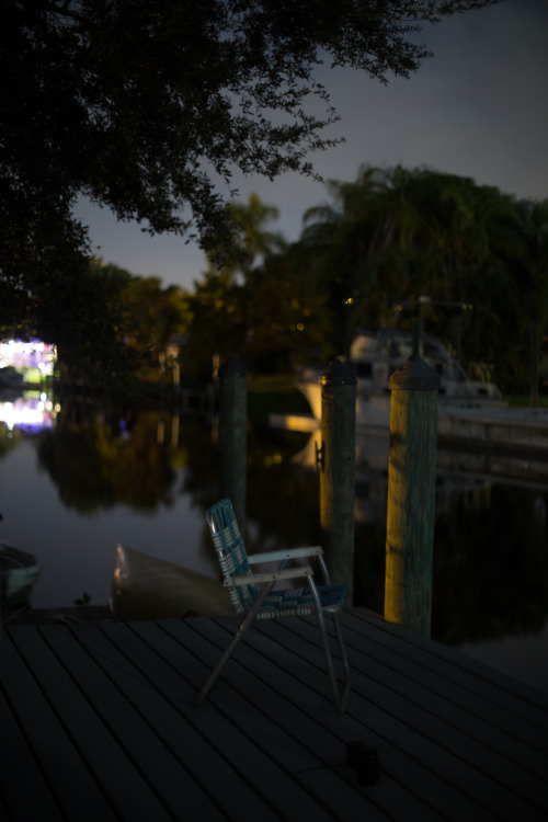 Dad’s Dock Chair, N Fort Myers, FL December 2015.  Canon 6D w/ Nikkor 50mm @ F/1.2 ISO 400, 4 Second