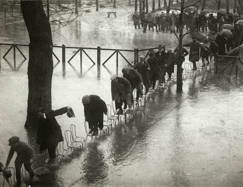 Porn photo People walk across a row of chairs to avoid