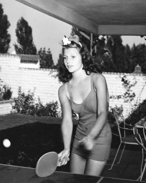 mylovelydeadfriends:Rita Hayworth playing ping pong, 1942