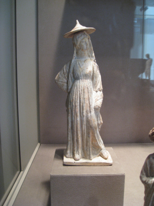 Ancient Greek Boeotian statue of a woman wearing a broad-brimmed sun hat