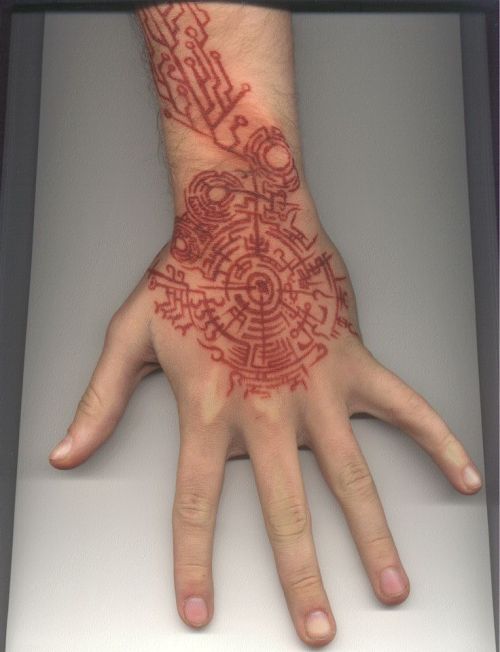 pizzopaps:alittlepieceofuniverse:Futuristic, cyber and circuit tattoos IItwo of them are the same be