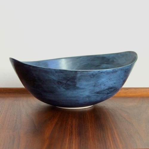 New curvy porcelain bowl with a painterly satin finish in shades of blue and black. Landing soon in 