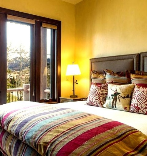Bedroom In DenverExample Of A Mid-sized Trendy Guest Carpeted Bedroom Design With Yellow Walls And No