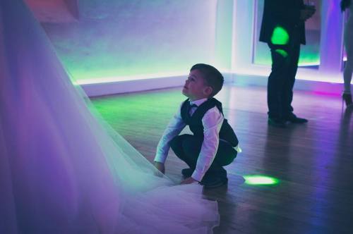 My beautiful boy sorting my dress at our wedding by charleyatwell