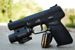 gunrunnerhell:  FN Five-seveN A pistol chambered in 5.7x28mm, it has a standard capacity of 20 rounds. There is a 10 round magazine for restrictive states, but on the opposite end, there are also 30 round magazines for those who want more than 20. The