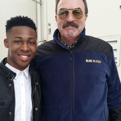 Elijah Boothe and Tom Selleck on the set of Blue Bloods