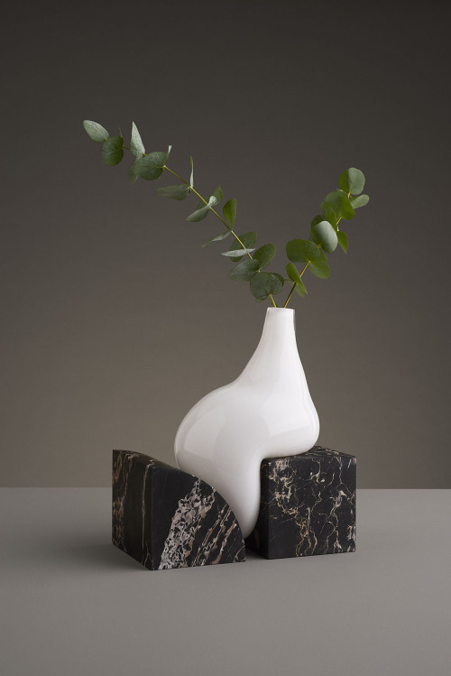 talkingtrashcan:taktophoto:Misshapen Glass Vases by Studio E.O Appear to Melt Atop Angular Stone Pla