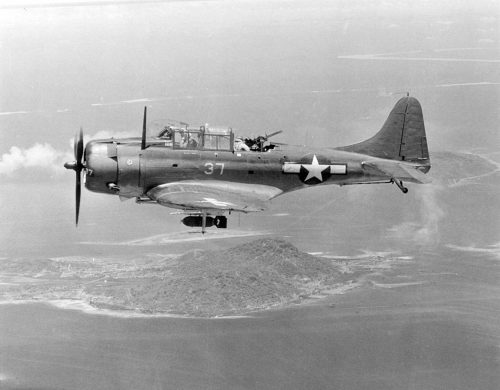 ww2photoarchive:Douglas SBD-5 Dantless of US 16th Squadron in flight over Dublon Island Dauntless