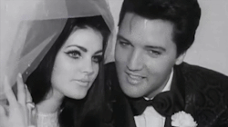 lostinhistorypics:Newlyweds Elvis and Priscilla pose for the cameras at the press conference following their wedding, Aladdin Hotel, Las Vegas, NV, May 1, 1967.