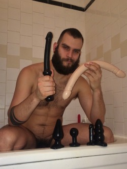 abeardedboy:  more of the toys that my buddy justin sent me, i sometimes wear that black plug at work, during my entire bartending shift. love how it feels and locks itself inside my hole.