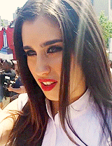 5harmonism:  Lauren climbing on a wall to greet fans and take pictures with them