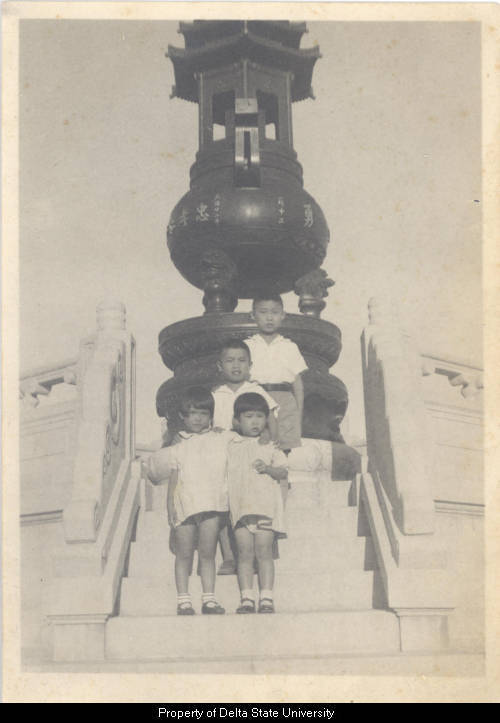 Delta State University: A photograph of H. Wong’s children at Sun Yat-Sen Masoleum in Nanjing,