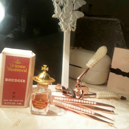 Bedside view of my dresser #1! (Rose gold/pearl handle tweezers and eyelash curlers purchased at Pri