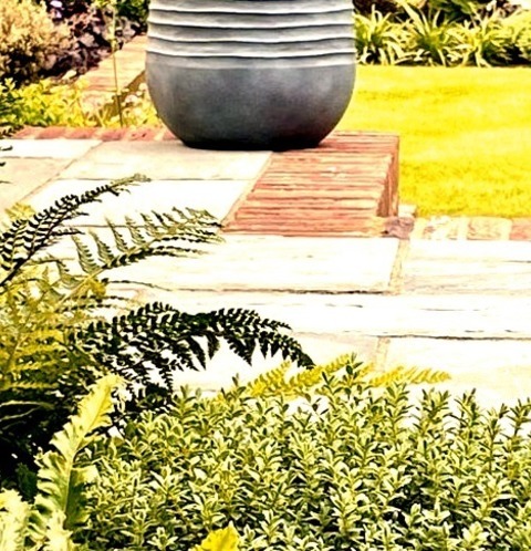 London Landscape Retaining WallsDesign Ideas For A Mid-sized Craftsman Partial Sun Backyard Stone Retaining