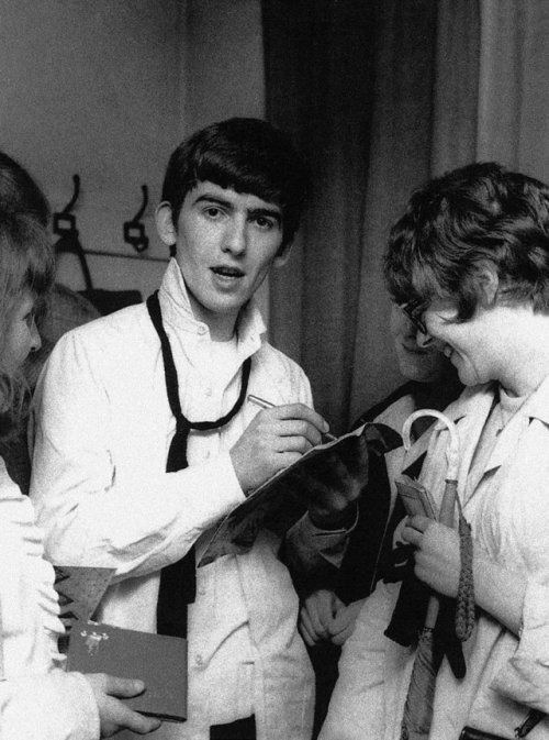 the-cosmic-empire: Girls collect autographs from a bunch of half dressed Beatles “backstage” at Stow