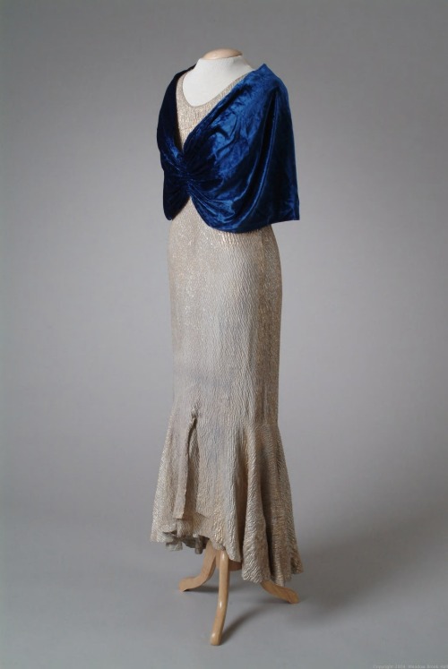 Evening dress and cape, Henri Bendel, dress of textured silver tissue, cape of silk velvet trimmed w