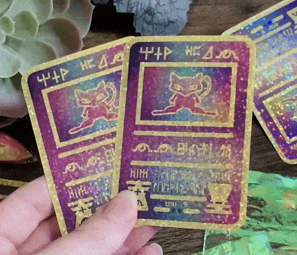 retrogamingblog2:  Holographic Ancient Mew Pokemon Card Stickers made by LuckyLionClub