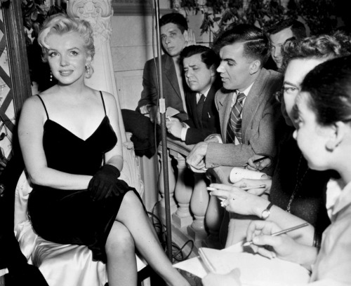 infinitemarilynmonroe: Marilyn Monroe at a press conference in New York, 1956.