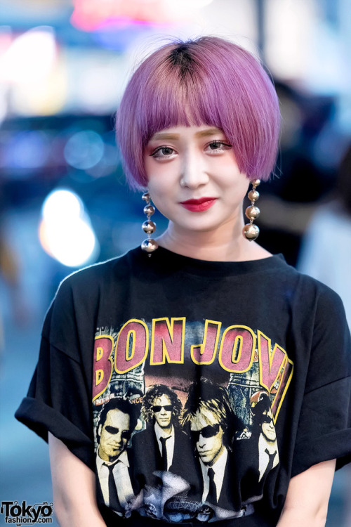 Nakyeong on the street in Harajuku wearing a Bon Jovi band tee with striped pants, platform bow sand