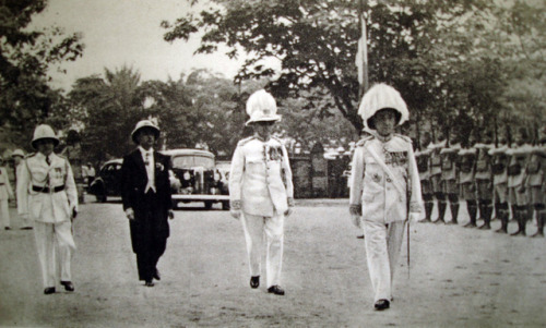 Belgian colonial officials conduct a ceremony dedicating a statue of Belgian King Albert I in Leopol