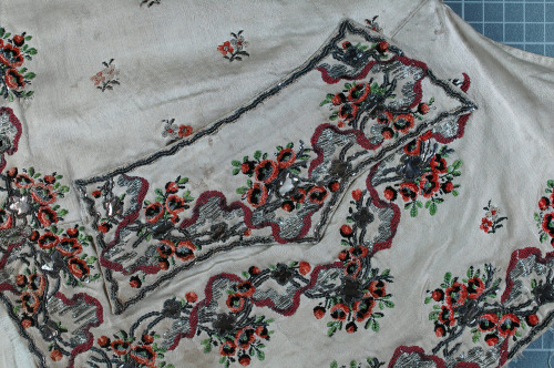 Men&rsquo;s waistcoat, c1768-72White satin embroidered flowers and floral border, red brown gree