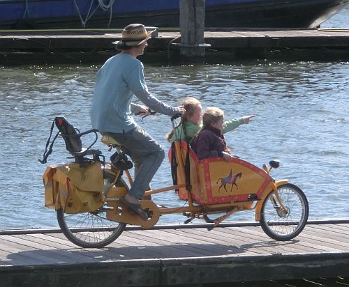 bicycle-amsterdam: Childern transport on cargobike. MArtitiem Quarter, Amsterdam.