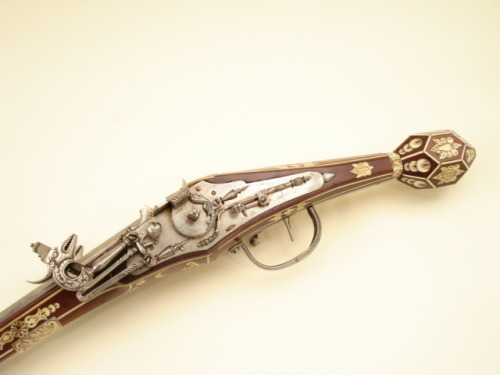 A double barrel Saxon made wheel-lock pistol, circa 1610.Estimate Value: $40,000 - $60,000