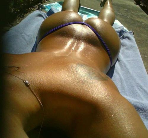 ourcutebutts:  Tanning Ass