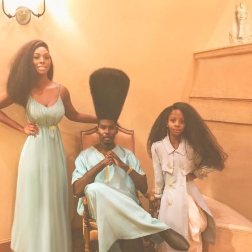sartorialadventure:    Benny Harlem, an aspiring singer, songwriter, and model, holds the Guinness Book of World Records’ title for tallest high top afro at 52.07 cm (20.5 inches). Photos with his daughter Jaxyn have taken social media by storm.