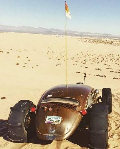 vw buggy on the sand.unknown sourceMore rat rod here.