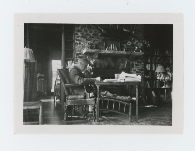 FDR sits in his favorite chair while working inside his cottage at Warm Springs, April 1945. The President was seated in this chair when he suffered a fatal cerebral hemorrhage on April 12, 1945. NPx 73-113:136
