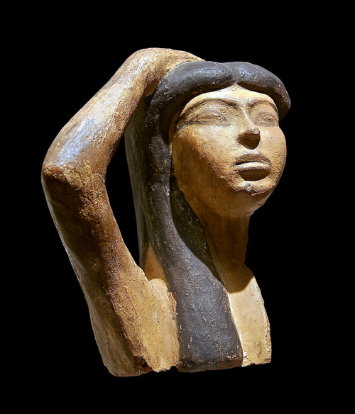 Terracotta bust of a lamenting woman (possibly Isis mourning Osiris) New Kingdom, 18th Dynasty, c. 1