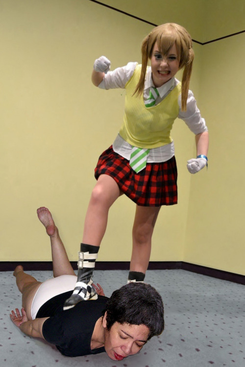 lovevictorypose: Slave Pia beaten up, stomped and posed over by a victorious teen cosplayer
