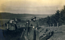 Edwardian lady with shotgun.