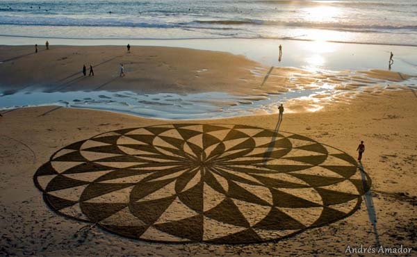  Andres Amador is an artist who uses the beach as his canvas, racing against the