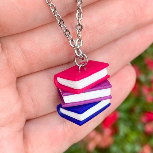 justlgbtthings:sosuperawesome:Pride Book Stack Jewelry and KeychainsShiny Stuff Creations on Etsy i