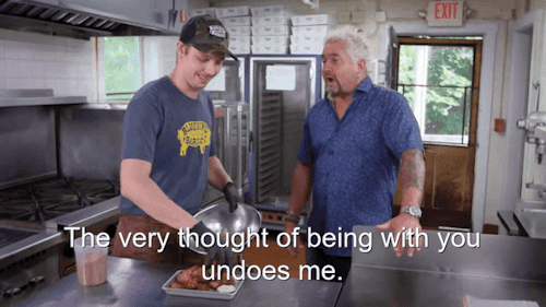 43% sure it's Guy Fieri et al. standing in a kitchen with a pot of food. Caption: The very thought of being with you undoes me.