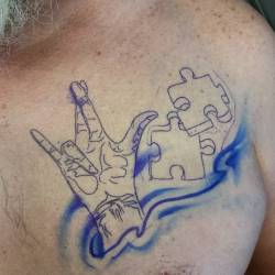 goldentouchtattoo:  Signing up for Love…#TopRockerTattoo #signlanguage #autismsymbol #chestTattoo #puzzlepiece  (at Top Rocker Tattoo)