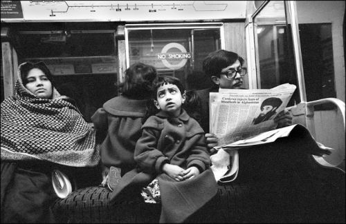 32 candid photographs of the London Underground in the late 1980s.