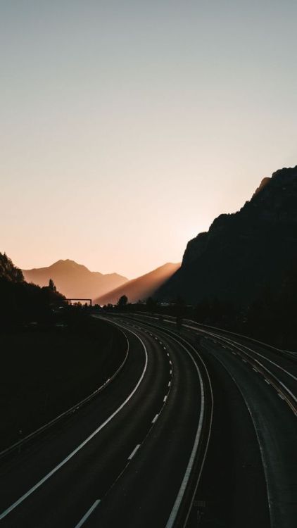 720x1280 Road, highway turn, mountains, silhouette wallpaper @wallpapersmug : bit.ly/2EBfd6v 