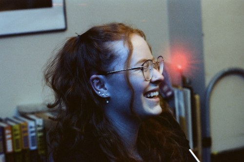 Lauren laughing by K.Devlin Pentax K1000 w/ Tamron CF Tele- Macro 80-210mm f/3.8-4 Cinestill 800T +1