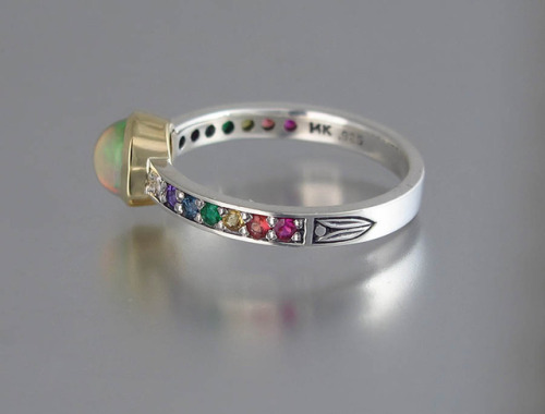 Ring in rainbow colors: Ethiopian opal, ruby, orange sapphire, yellow sapphire, emerald, blue topaz,