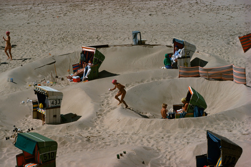 Sunbathers shelter from chilly North Sea breezes in sand pits, August 1977.Photograph by Robert Madd