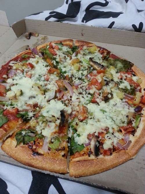veganpizzafuckyeah:  I ordered a veggie pizza then added my own cheese at home. The basil really makes it.  Oh my god