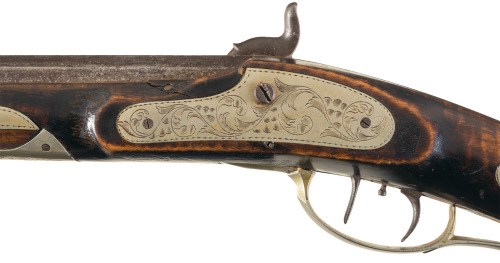 A silver mounted half stock percussion muzzleloading rifle, mid 19th century.