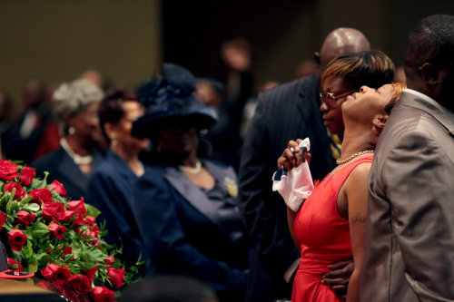 stereoculturesociety:  CultureHISTORY: #MikeBrown Funeral - August 2014  Mike Brown casket w/ St. Louis Cardinals baseball cap Brown’s mother Lesley McSpadden at her son’s service Attendees united in song Funeral attendees Memorial including long