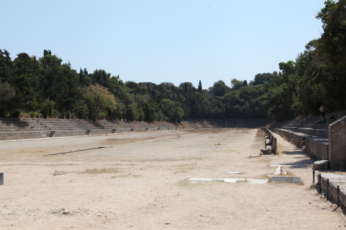 shatteryourleaves:The ancient stadium and theater from the Acropolis of Rhodes Town, originally cons